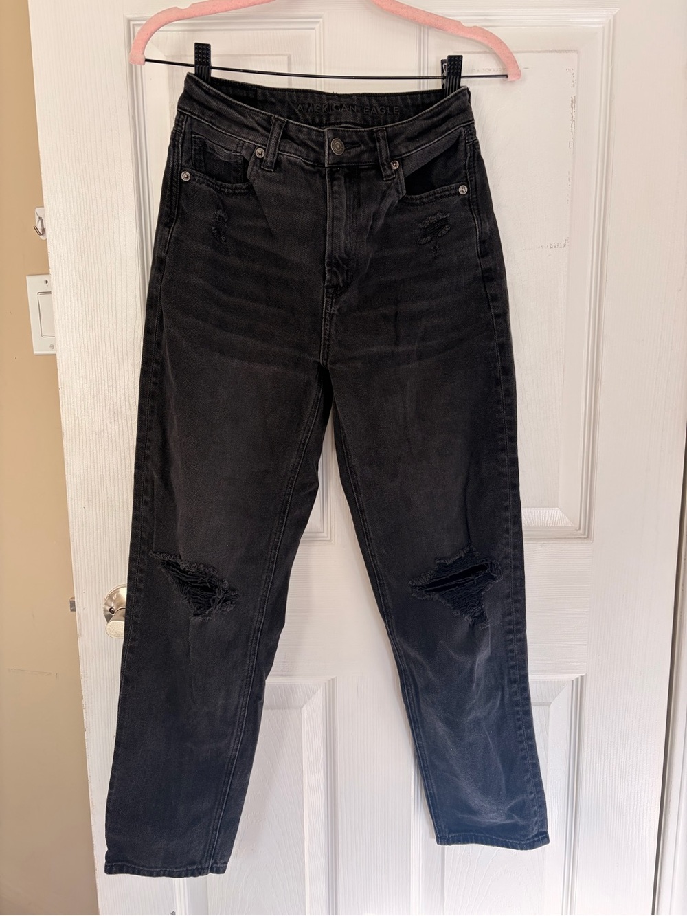 Woman’s Black Distressed Jeans